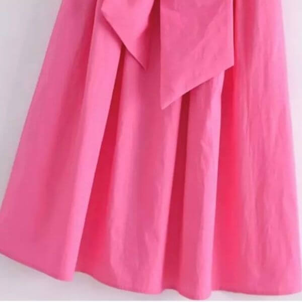 Vestido rosa con lazo grande sin mangas 5